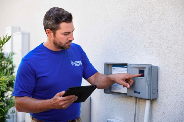 A person pointing at a device