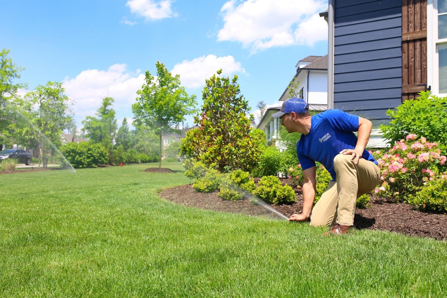 A person spraying a lawn
AI-generated content may be incorrect.
