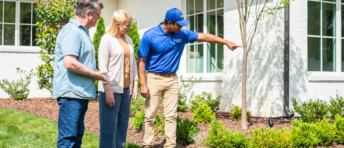Conserva Irrigation employee with clients